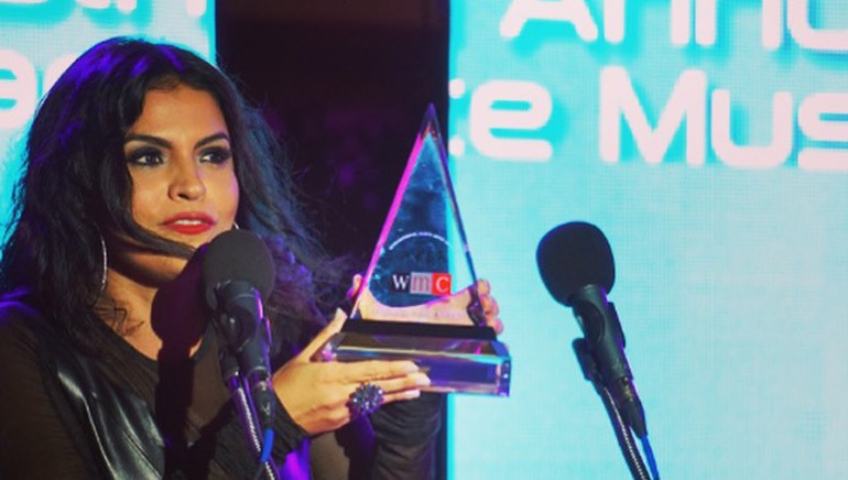 Vassy accepts her International Dance Music Award. The ceremony was held in Miami and recognizes the best dance music from the year.