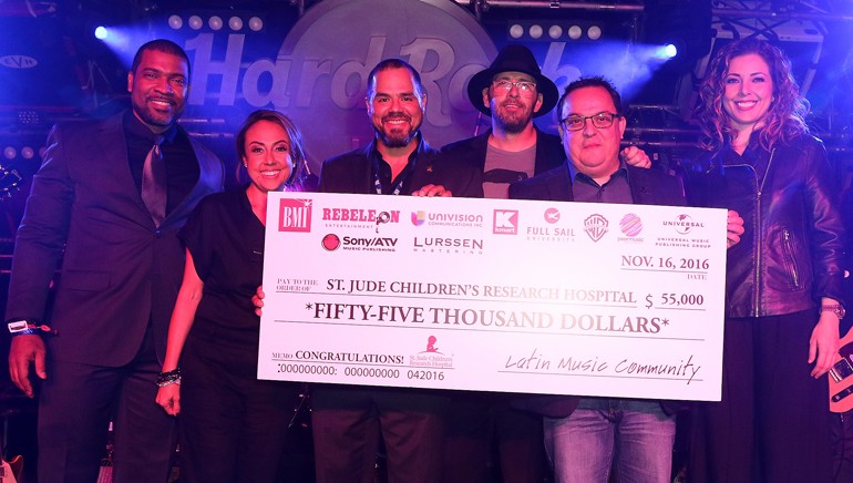 (L-R) Radio personality Carlos Alvarez, BMI’s Delia Orjuela, BMI’s Joey Mercado, Sebastian Krys, St. Jude’s John Ortiz and St. Jude’s Emmeline Garcia