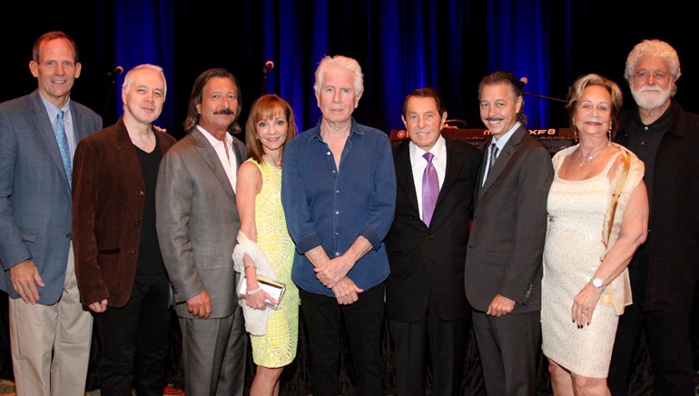 Pictured (L-R) BMI’s Dan Spears, BMI songwriter and guitarist Shane Fontayne, BBGI President Bruce Beasley,  BBGI Interim CEO Caroline Beasley, BMI songwriter and artist Graham Nash, BBGI Chairman George Beasley, BBGI COO Brian Beasley, BBGI’s Ann Beasley and Graham Nash’s manager Buddha Miller.