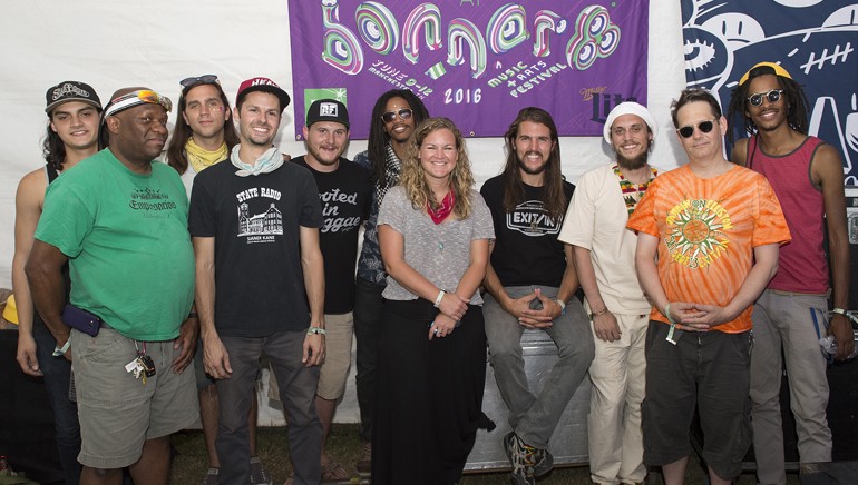 ROAR’s Marco Martinez, sound technician EL Copeland, ROAR’s Dan Twiford, Troy Wiggins, Zach Fowler and Jeremyck Smith, BMI’s Nina Carter, ROAR’s Austin Smith and Adam Quellhorst, sound technician Shaun Washburn and ROAR’s Justin Smith pose for a photo before their set as reigning champs of the BMI Road to Roo competition. 