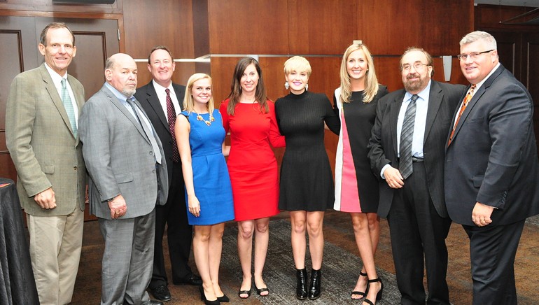 Pictured (L-R) after her performance at the Maryland Retail Association annual dinner are: BMI's Dan Spears, MRA Chairman and All Sports Photo owner Bernie Salganik, MRA Treasurer George Petty, MRA Legislative and Membership Assistant Maddy Voytek Maryland Governor Larry Hogan's Deputy Chief of Staff Jeannie Haddaway-Riccio, BMI singer-songwriter Maggie Rose, MRA President Cailey Locklair Tolle, MRA Past Chairman & Wawa executive Alex Krowzow and MRA 1st Vice Chairman Tom Cormier with Ahold USA.