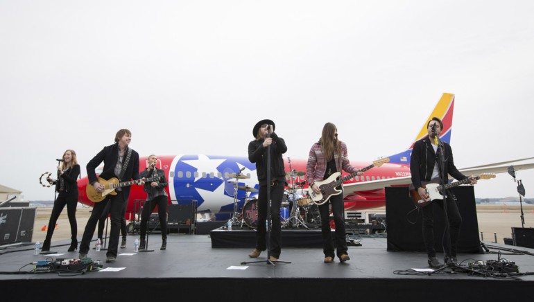 BMI artists A Thousand Horses perform in front of the newest Southwest Air plane.