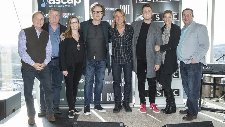 Pictured: (L-R): BMI’s Jody Williams, ASCAP’s Mike Sistad, BMG’s Sara Knabe, ASCAP songwriter Greg Wells, BMI artist Keith Urban, SESAC songwriter JHart, SESAC’s Shannon Hatch and Universal’s Kent Earls.