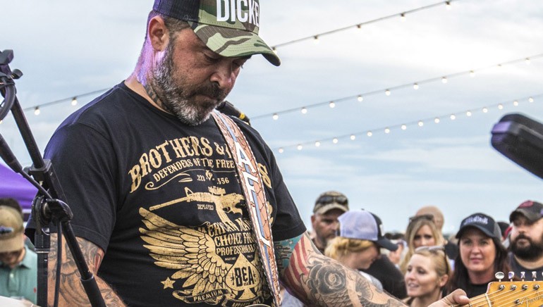 BMI songwriter Aaron Lewis performs for hundreds of his biggest fans at the BMI Summer Concert Rooftop Series in Nashville.