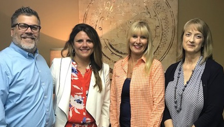 Pictured (L-R) are: TAA Marketing Director Scott Meert, BMI’s Devon Kolozsi, TAA Executive Director Diane Carter and TAA Administrator Bobbi Turner.