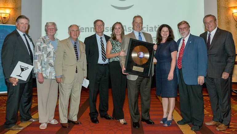 Pictured (L-R) during the presentation are: TAB lobbyist and owner of Gullett, Sanford, Robinson & Martin, Dan Haskell; President and CEO Maine Broadcasters Association, Suzanne Goucher; President Cromwell Group Inc., Bud Walters; TAB Counsel and Partner of King & Ballow, Doug Pierce; TAB Board Chairman and President / General Manager Five Star Radio Group, Katie Gambill; TAB President, Whit Adamson; BMI’s Jessica Frost; President Thunderbolt Broadcasting, Paul Tinkle; and Vice President / General Manager Bonten Media Group, Jack Dempsey.