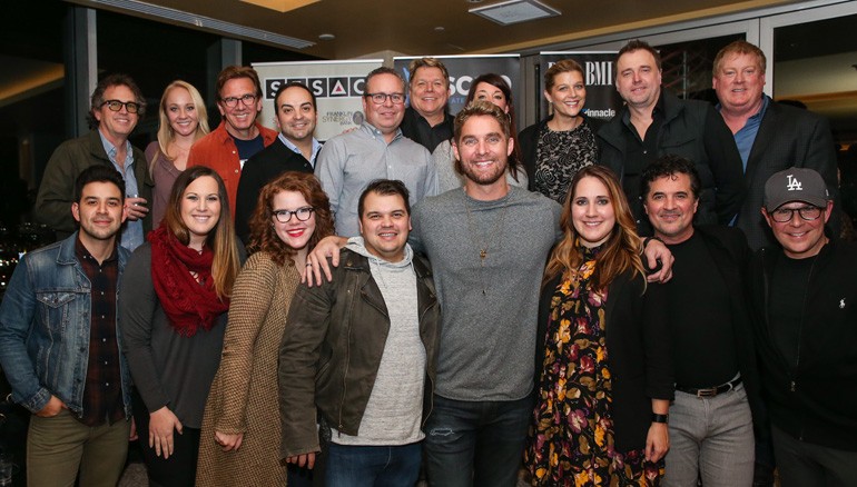 Pictured: (L-R): Back row: Producer and engineer Justin Niebank, Big Machine’s Laurel Kittleson, producer Dann Huff, Big Machine’s Mike Molinar, Downtown Publishing’s Steve Markland, BMI’s David Preston, Word Publishing’s Janine Appleton, SESAC’s Shannon Hatch, Red Creative’s Jeremy Stover and ASCAP’s Mike Sistad. Front row: Downtown Publishing’s Danny Berrios, Red Creative’s Brooke Antonakos, Downtown Publishing’s Natalie Osborne, songwriter Justin Ebach, singer/songwriter Brett Young, BMI songwriter Kelly Archer, Big Machine’s Scott Borchetta and Jimmy Harnen.