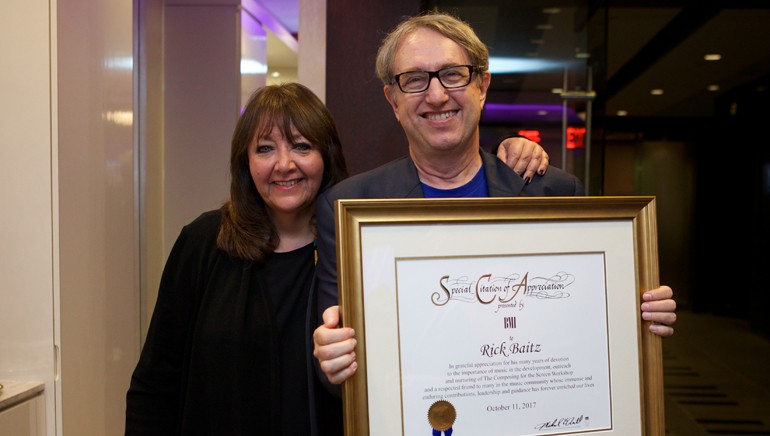 BMI Vice President Film, TV & Visual Media Relations Doreen Ringer-Ross presents BMI composer Rick Baitz with a certificate of appreciation during the reception celebrating 10 years of the “Composing for the Screen” workshop.