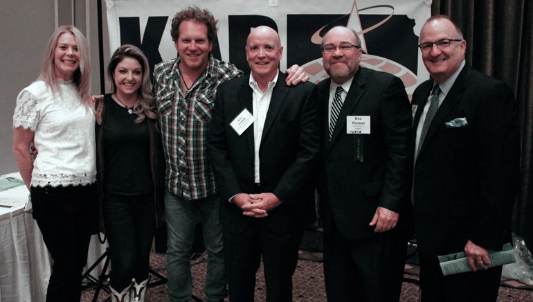 Pictured (L-R) after the performance are: BMI’s Amy Glover, Danielle Bourjeaurd, BMI songwriter Joe Denim, KAB President and Executive Director Kent Cornish, KAB Board Chairman and KVOE/KFFX’s Ron Thomas, and GM of KWBW, KHVT, KHMY and former KAB Board President, Mark Trotman.