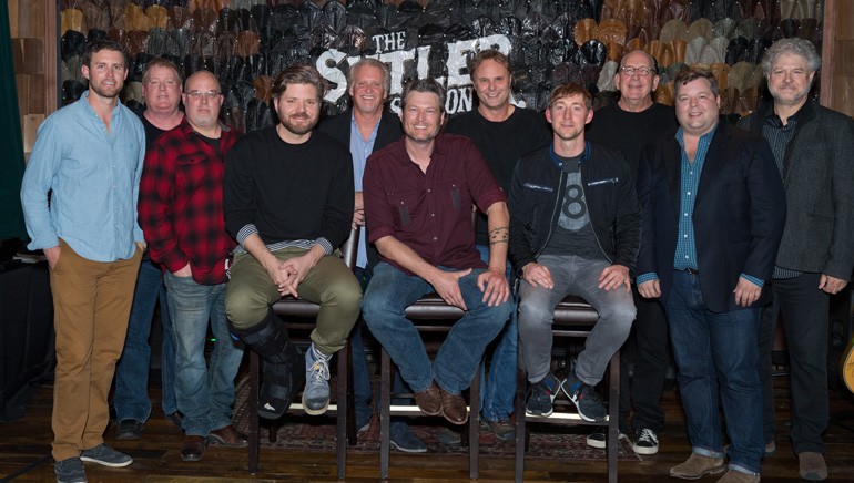 Pictured: (L-R): back row: Warner Chappell’s Ryan Beuschel, ASCAP’s Mike Sistad, Sea Gayle’s Marc Driskill, Combustion’s Chris Farren, producer Scott Hendricks, Warner Bros. Nashville’s John Esposito, BMI’s Bradly Collins, Spirit’s Daniel Hill. Seated: Songwriter BMI songwriter Bryan Simpson, BMI artist Blake Shelton, ASCAP songwriter Ashley Gorley.