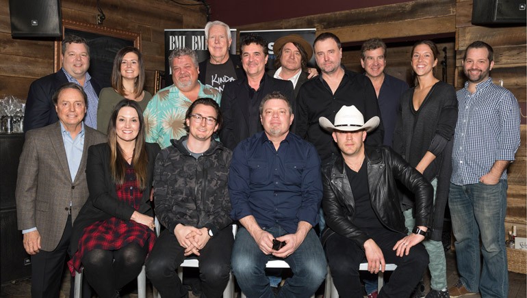 Pictured (L-R - Back row): BMI’s Bradley Collins, Creative Nation’s Beth Laird, Big Loud Shirt’s Craig Wiseman, Big Machine’s George Briner and producer Scott Borchetta, producers Julian Raymond and Jeremy Stover Pulse Song’s Scott Cutler, Round Hill’s Penny Gattis and Big Loud Shirt’s Seth England. (Front row): BMI’s Jody Williams, BMI songwriter Natalie Hemby, songwriter Matt Dragsteam, BMI songwriter Rodney Clawson and BMI artist Justin Moore.