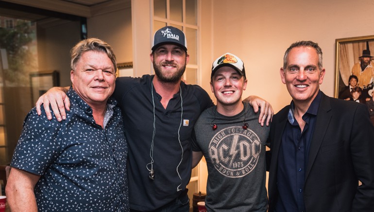 BMI’s David Preston, Riley Green, Travis Denning and BMI’s Mike O’Neill gather backstage at BMI’s Rooftop On The Row.