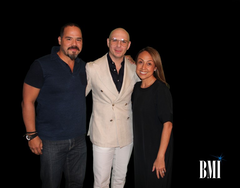 Pictured: BMI’s Joey Mercado, Pitbull and BMI’s Delia Orjuela