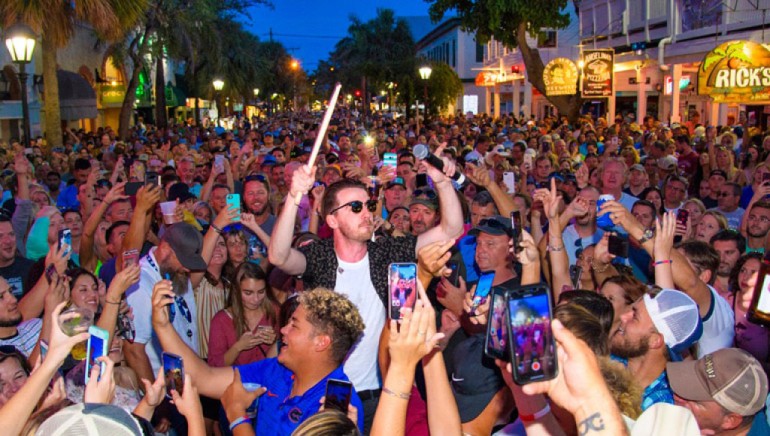 Brandon Lancaster of LANCO performs in the crowd at the Duval Street Stage during the Key West Songwriters Festival on May 12, 2018, in Key West, Florida.
