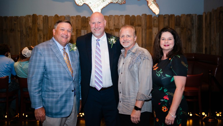 Pictured (L-R) before Frank Myers’ performance are: LRA President and CEO, Stan Harris; LRA Board Chair and owner of Pitt Grill Restaurant, Rob King; BMI songwriter Frank Myers and BMI’s Jessica Frost.