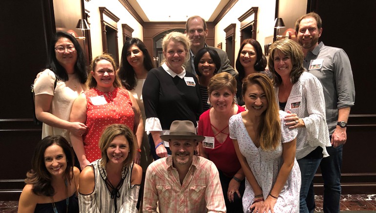 Pictured before Jack White’s performance at the 2018 NALCP conference are: (standing): Chipotle Mexican Grill’s Kim Oganesyan, Speedway LLC’s Jennifer Blessing, Live Nation’s Asally Adib-Samadian, Darden Restaurants’ Colleen Hunter, BMI’s Dan Spears, Starbucks’ Robin Howard, NALCP Board Member Becky McKeithan, Red Robin’s Amanda Black, Craftworks Restaurants’ Courtney Mowry and Whole Foods’ Ryan Bissett. (Kneeling):  Dave & Busters’ Jill Valachovic, Bowlmor AMF’s Portia Bagby, BMI songwriter Jason White and Sprouts Farmers Market’s Tina Redfern.