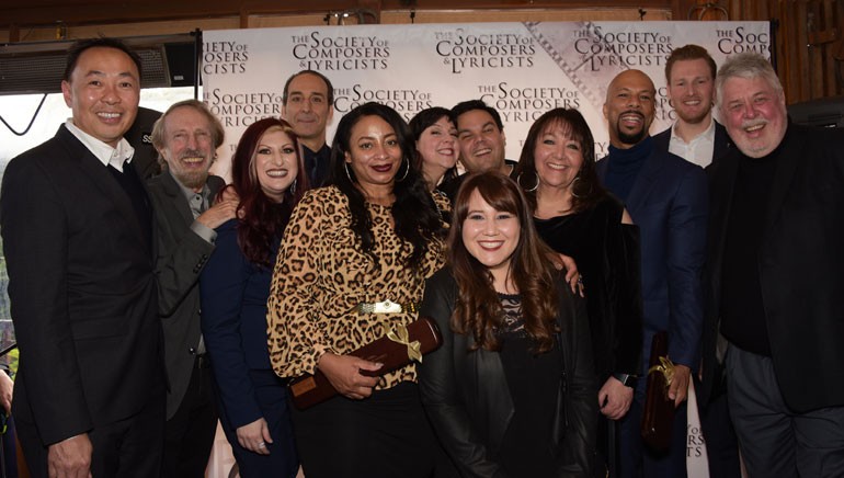 BMI executives gather for a photo with this year’s Oscar-nominated composers and songwriters.