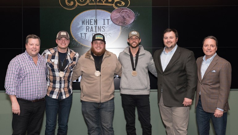 BMI’s Bradley Collins, Mason Hunter and Jody Williams pose with “When It Rains It Pours” co-writers Jordan Walker, Luke Combs and Ray Fulcher.