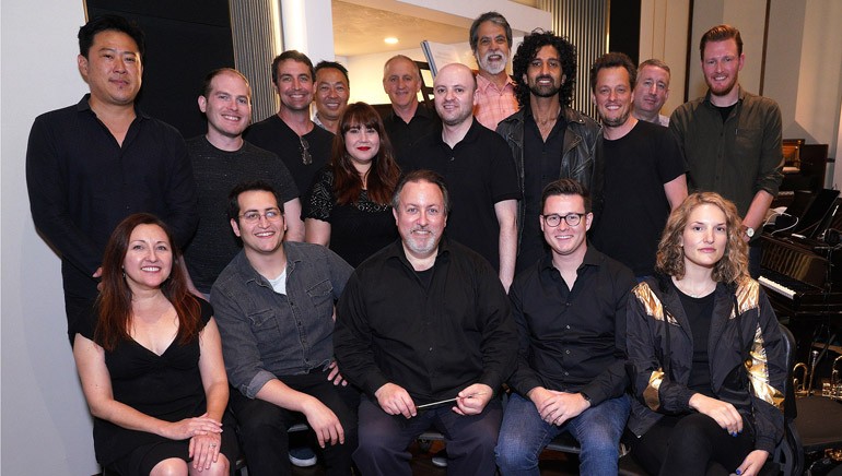Pictured (L-R) at the BMI conducting workshop are (front row):  BMI composer Cindy O’Connor, BMI composer Ben Bromfield, BMI composer and conductor Lucas Richman, BMI composer Andy Forsberg and BMI composer Genevieve Vincent. Back row (L-R):  BMI composer Timo Chen, BMI composer Alex Bornstein, BMI composer Peter Karr, BMI’s Ray Yee and Evelyn Rascon, musician contractor David Low, BMI’s Philip Shrut, Music Editor Chris Ledesma, BMI composer Oumi Kapila, BMI composer/ Bandrika studio owner Nate Barr, concertmaster Mark Robertson and BMI’s Chris Dampier.