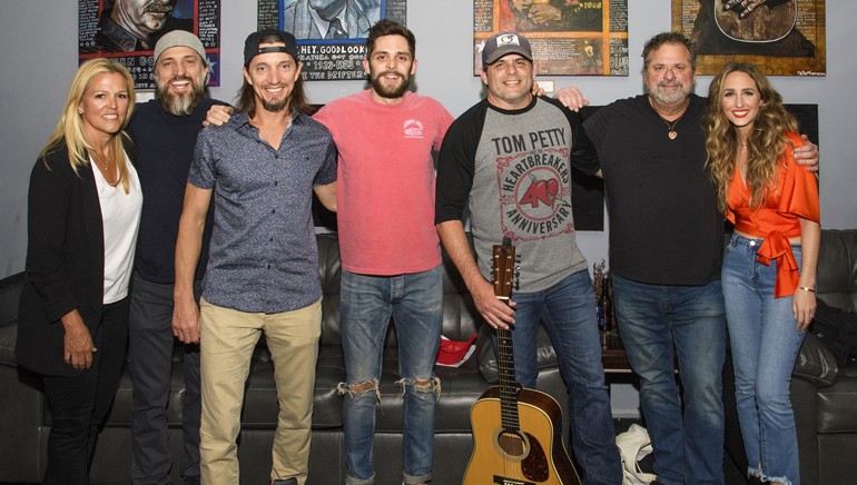 BMI's Leslie Roberts, The Warren Brothers, Thomas Rhett, Rhett Akins, Bob DiPiero and Parker Welling pose backstage at BMI’s Tin Pan South show.