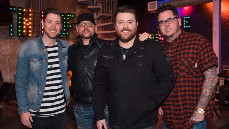 Corey Crowder, Chris Destafano, Chris Young and Josh Hoge pose before the celebration for Chris Young’s tenth No. 1 “Losing Sleep.”