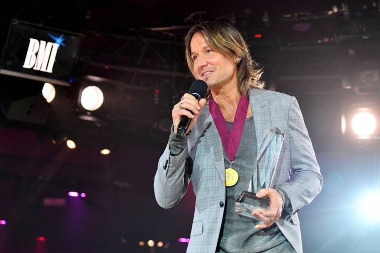 Keith Urban accepts the 2017 Champion Award onstage during the 65th Annual BMI Country Awards