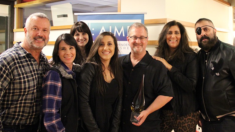 The PEN Music Group team accepts their award for Indie Publisher of the Year during the AIMP holiday party, held at BMI’s Los Angeles office on December 5. Pictured (L-R) are Patrick Conseil, Nikki Discola, Karen Falzone, Rebecca Valice, Michael Eames, Mallory Zumbach and Mark Nubar.