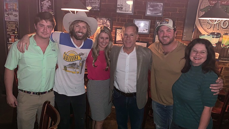 Gathered for a photo before the performance at Alchemy in Mobile, AL are: Director of Grassroots & Chapter Development JB Hampton, BMI singer-songwriter Paul McDonald, ARHA Senior Director of Membership Shea Perkins, Visit Mobile President & CEO David Clark, BMI singer-songwriter Tyler Reeve and BMI’s Jessica Frost.