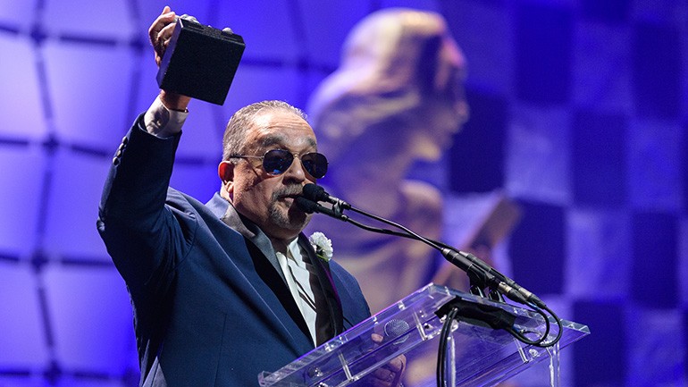 Willie Colón celebrates his induction into the Latin Songwriters Hall of Fame's 7th Annual La Musa Awards.