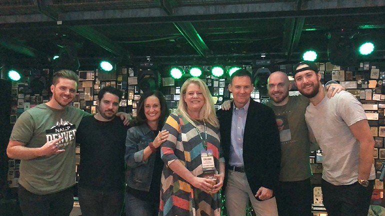 Pictured before BMI band Northern National takes the stage at the NALCP annual conference kickoff party at Ophelia’s Electric Soapbox in Denver are: Northern National’s Michael Kanne, and Michael Rossi, NALCP Executive Director Jill Valachovic, Darden Restaurant Director of Licensing and NALCP Board President Colleen Lyons, BMI’s Brian Mullaney, and Northern National’s Anthony Comas and Dylan Green. 