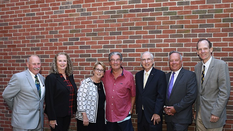 Members of the Hall Communications corporate staff pause for a photo with Rock & Roll Hall of Famer Terry Sylvester before his performance at the radio company’s annual awards dinner. Pictured (L-R) are: Hall Communications Vice President Tom Wall, Hall Communications CFO Janet Hamm, Hall Communications Board Chair Bonnie Rowbotham, Terry Sylvester, Hall Communications President Art Rowbotham, Hall Communications Senior Vice President Dan Dubonnet and BMI’s Dan Spears.