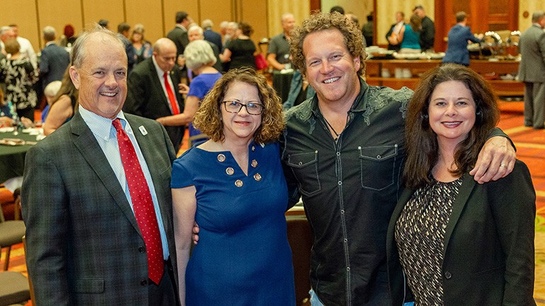 Pictured (L-R) before Denim took the stage are: TAB President Whit Adamson, TAB Board Chairman and General Manager WKRN Nashville Tracy Rogers, BMI songwriter Joe Denim and BMI’s Jessica Frost.