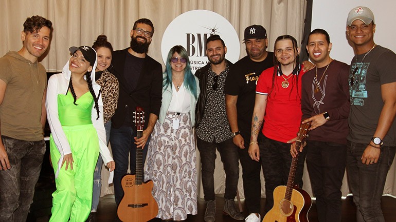 Pictured (L-R) Nestor Martinez, Vanessa Ayala, Lauren Davidson, Mario Guini, BMI’s Mary Russe, Cristian Castro, DJ Napoles (Edward Grullon), Papo Straker (Carlos Sanchez), Duey Meza (Jeffrey Meza), and Randy Whisky during BMI’s Guitar Workshop in New York.