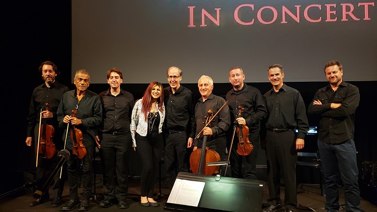 BMI’s Anne Cecere joins Emmy-winning composer Jeff Beal on stage after his concert featuring music from “House of Cards.”