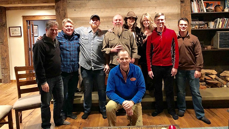 Pictured (L-R) after the special house party performance for BMI licensing customers and association partners during the Mountain High Music Festival are: (Standing) Nielson Audio VP of Audience Insights Tony Hereau, BMI’s David Preston, BMI songwriters Lance Carpenter and Kendell Marvell, Colorado Restaurant Association President and CEO Sonia Riggs, Colorado Restaurant Association VP of Strategic Partnerships Devany McNeill, Cherry Creek Radio CEO Jonathan Brewster, and Colorado Broadcasters Association President and CEO Justin Sasso. (Kneeling) BMI’s Dan Spears.