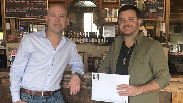 Pictured are BMI’s Mitch Ballard and BMI songwriter Wade Bowen