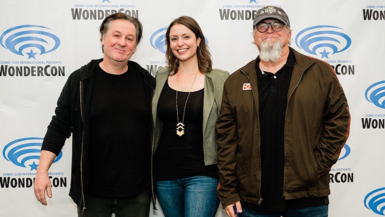 (L-R) Panelists John Murphy, Stephanie Economou and Kevin Kiner gather for a photo at WonderCon on April 1, 2022 at the Anaheim Convention Center in Anaheim, CA.