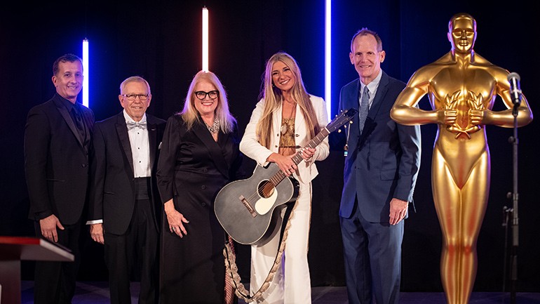 Pictured before the 2023 RHA Stars of Industry Awards (L to R): Angelo’s Palace Pizza & Antonio’s Pizza by the Slice owner and RHA Board Chair Bill Kitsilis, Tony DeFusco, RHA CEO Dale Venturini, BMI songwriter Julia Cole, BMI’s Dan Spears.