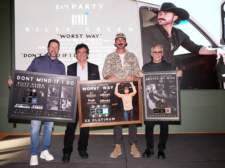 BMI’s Riley Green with No. One plaques for “Don’t Mind If I Do” and “Worst Way”