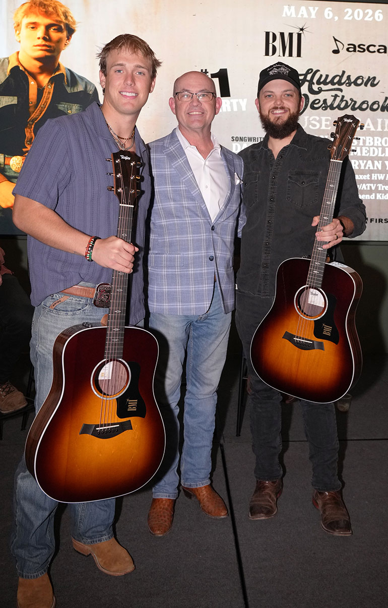 Hudson Westbrook gifted with a custom Taylor 210e DLX guitar
