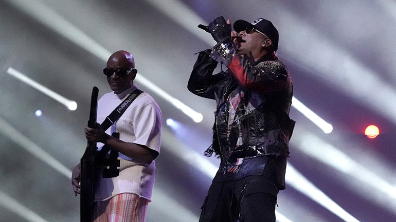 Sergio George and Wisin perform at the 2024 Premios Juventud.