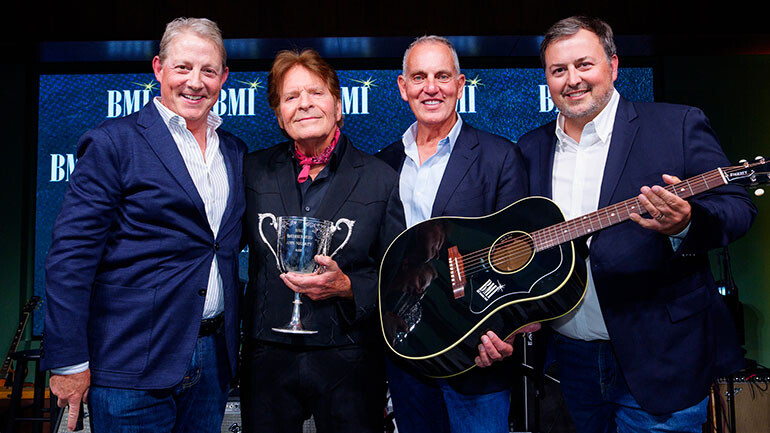 BMI presents John Fogerty with its coveted Troubadour Award (L-R) BMI's Clay Bradley, Troubadour John Fogerty, BMI’s Mike O’Neill and BMI’s Mason Hunter.