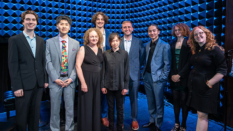 L-R: 2026 Winner Calvin Rice, 2026 Winner Jacky Jiaqi Liu, BMI AVP, Creative – Classical and Jazz Deirdre Chadwick, 2026 Winner Jackson A. Waters, 2026 Winner Cheryl Gau, 2026 Winner Cole Reyes, 2026 Winner Kevin Cromer, 2026 Winner Maya Miro Johnson, BMI Foundation Senior Director Susan Bywaters attend the 2026 BMI Composer Awards at Joe’s Pub on Mary 27, 2026.