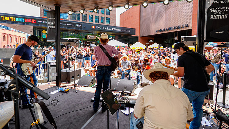 Colton Dawson draws in music fans during his performance on Saturday at the fifth annual Ryman & BMI Block Party.