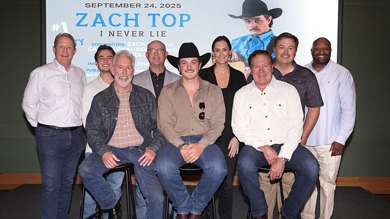 Photo Back Row L-R: BMI’s Clay Bradley, BMI’s Jackson Kiger, BMI’s Mitch Ballard, BMI’s MaryAnn Keen, BMI’s Mason Hunter, BMI’s Shannon Sanders; Front Row L-R: Carson Chamberlain (BMI/Producer), Zach Top (BMI), Tim Nichols (BMI).