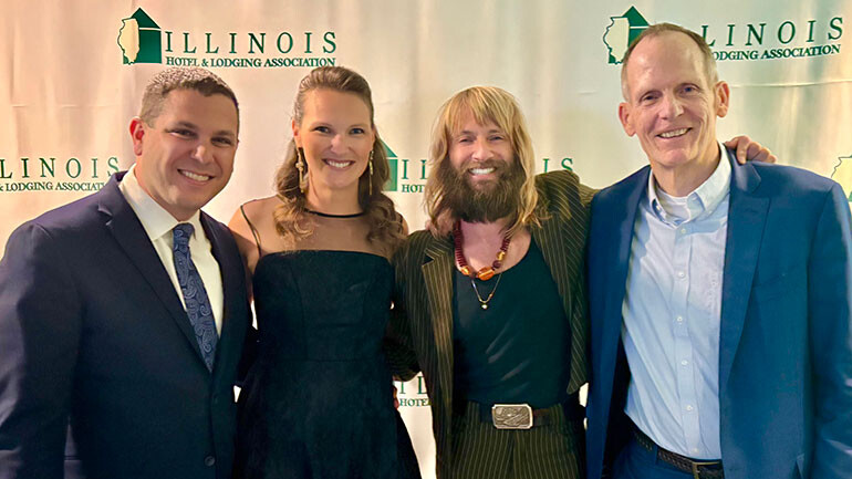 Pictured before BMI songwriter Paul McDonald hits the stage at the Illinois Hotel & Lodging Association’s “Spring Soiree” (L to R): Illinois Hotel & Lodging Association’s CEO Michael Jacobson and Sara Jacobson, BMI songwriter Paul McDonald, BMI’s Dan Spears.
