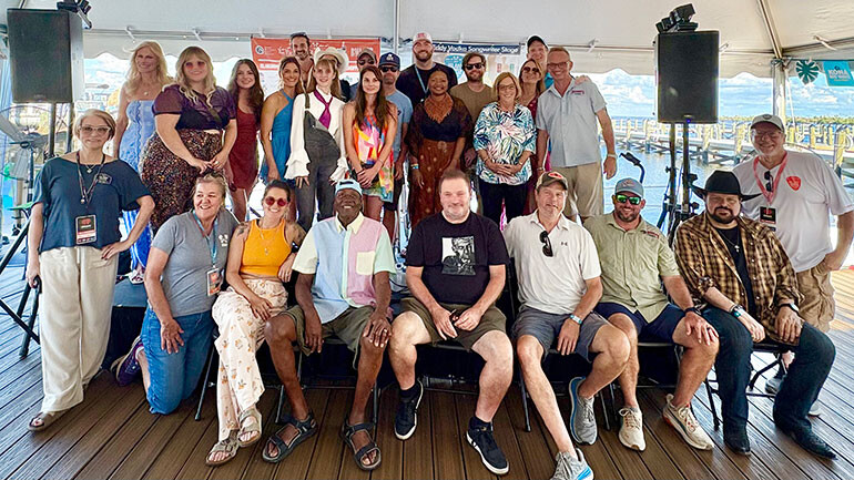 BMI songwriters who performed at the venues on Captiva Island are pictured with representatives from BMI,  iHeart Radio,  Fort Myers–Islands, Beaches, and Neighborhoods as well as other festival partners.