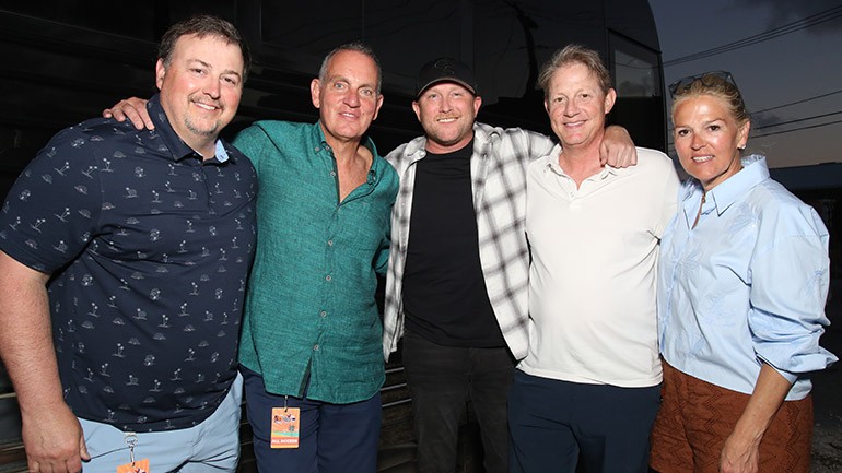 BMI’s Mason Hunter, BMI’s President & CEO Mike O’Neill, Cole Swindell, BMI’s Clay Bradley and BMI’s Leslie Roberts gather before the Coffee Butler Amphitheater show at the Key West Songwriters Festival, presented by BMI.