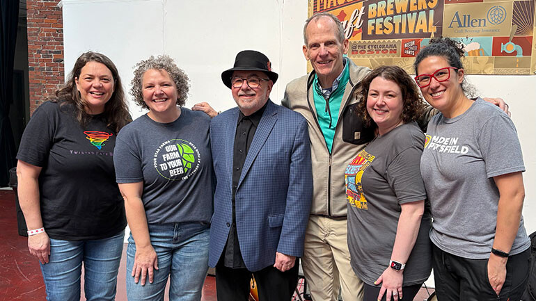 Pictured before BMI jazz composer Duke Robillard kicks off his set at the Massachusetts Craft Brewers Festival (L to R): Twisted Fate Brewing Company co-owner Erica Tritta, The Brewery at Four Star Farms co-owner Liz L’Etoile, BMI jazz composer Duke Robillard, BMI’s Dan Spears, Massachusetts Brewers Guild Executive Director Katie Stinchon, Hot Plate Brewing Company owner Sarah Real.