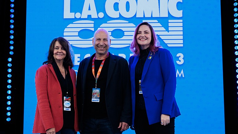 ( L-R) BMI’s Tracy McKnight, BMI composer Inon Zur and KUSC’s Jennifer Miller Hammel gather for a photo at the <em>Symphony of the Stars: Behind the Music of Starfield</em> panel during L.A. Comic Con on Saturday, December 2, at the Los Angeles Convention Center.
